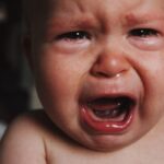 Close up image of crying baby